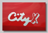 aa_Austin Metro City X 1990 badge