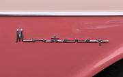 aa Mercury Monterey 1957 4-door sedan badgea